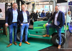 Jan vink, Cornall van Leeuwen and Joey van der Burg at the Tiger XL-E Lithium. A Zero Emission rough terrain truck.